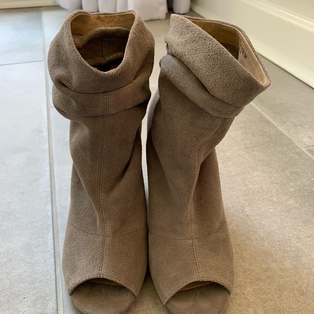 Size 8 booties. Wore once indoors.